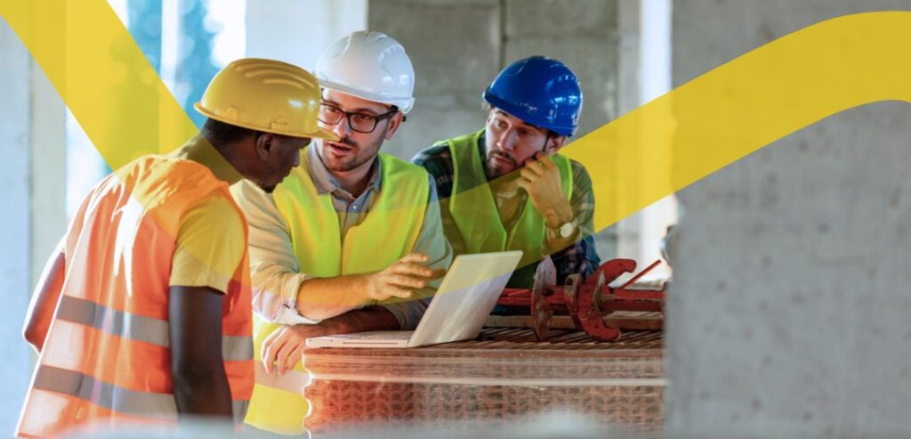 Construction professionals reviewing plans